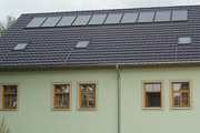 Indachmontage einer Solaranlage für Brauchwasser und Heizung
